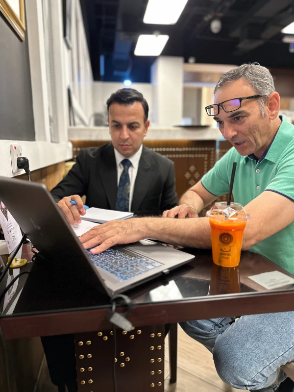 A business meeting between trading partners